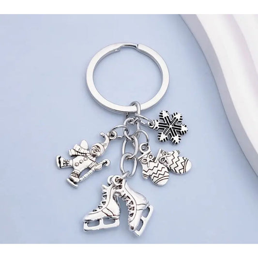 Nyckelring och väskhänge Snögubbe Skate