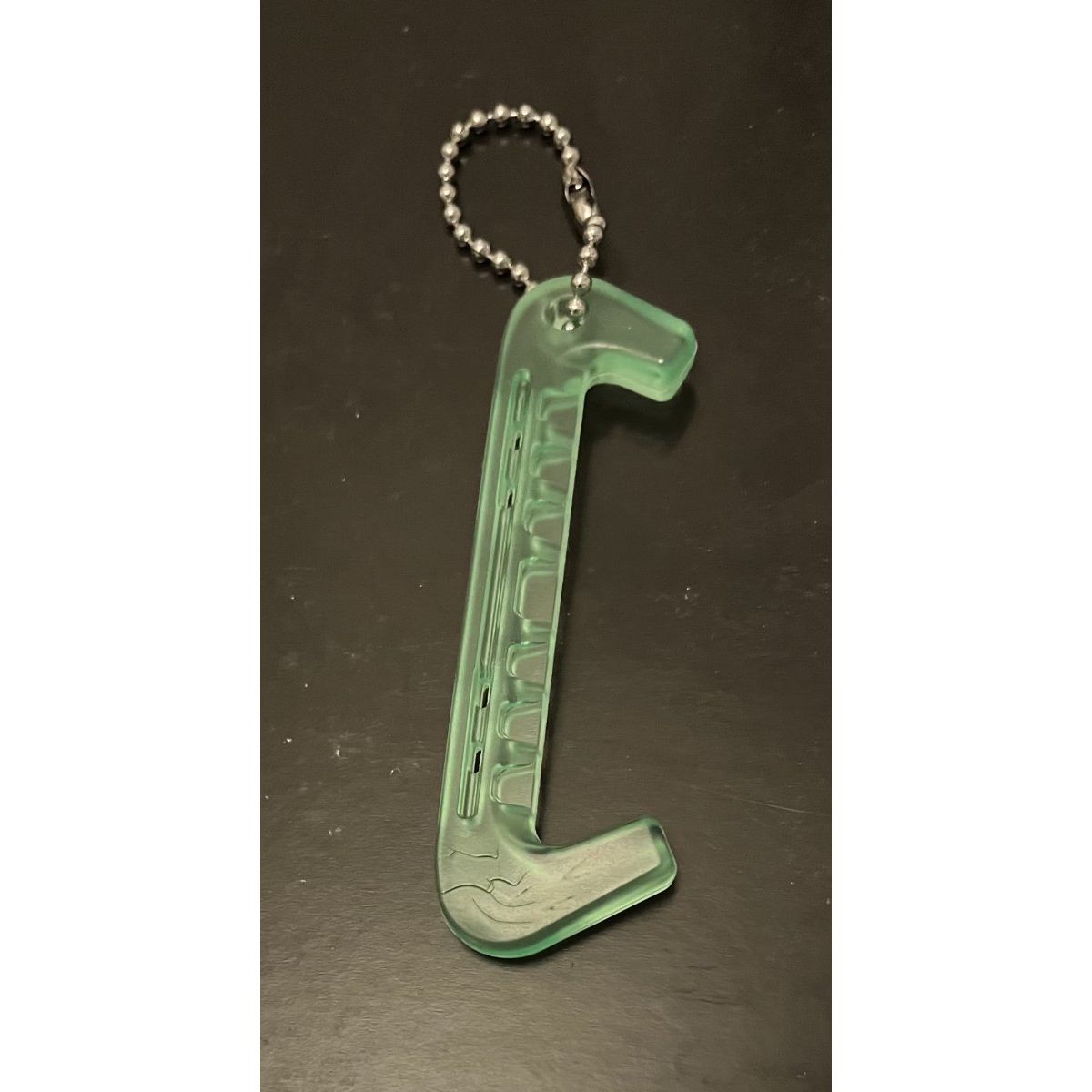 Nyckelring skridskoskydd