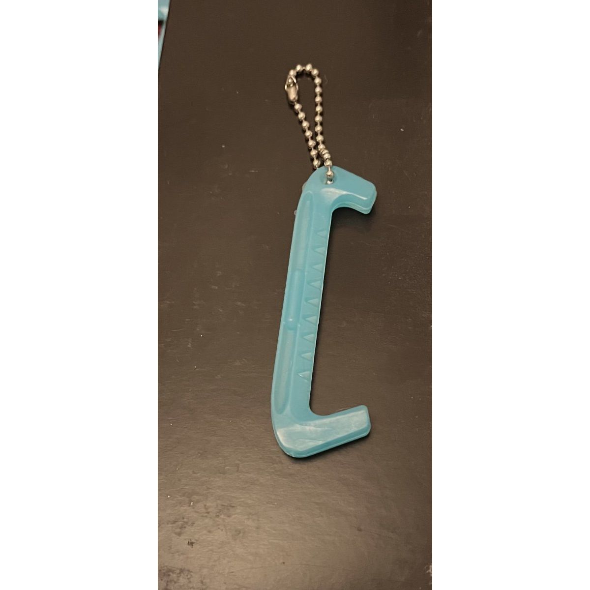 Nyckelring skridskoskydd